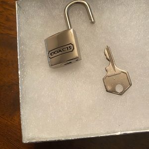 Coach padlock with key